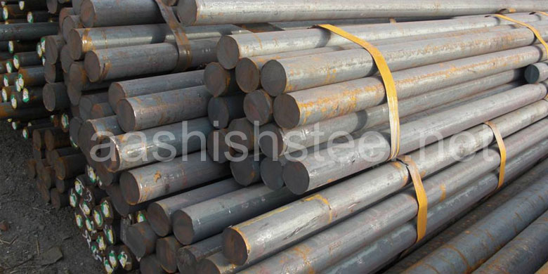 Original Photograph Of ASTM A350 LF2 Carbon Steel Round Bars At Our Warehouse Mumbai, India